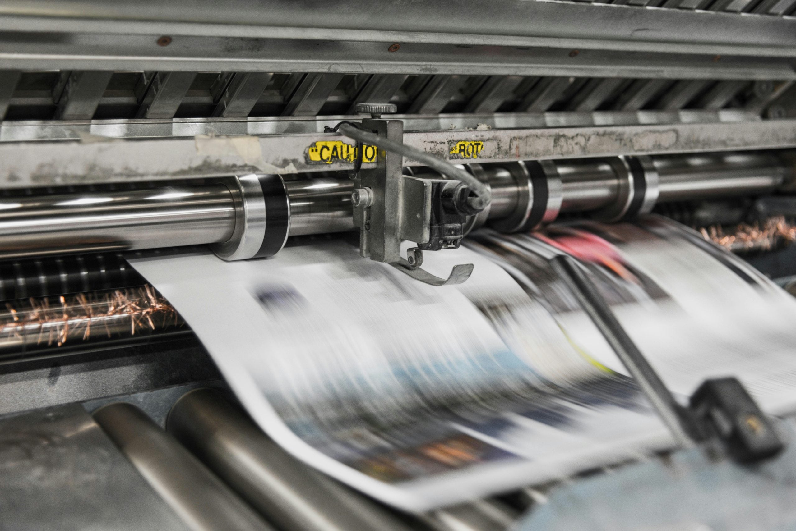 Newspapers being pressed