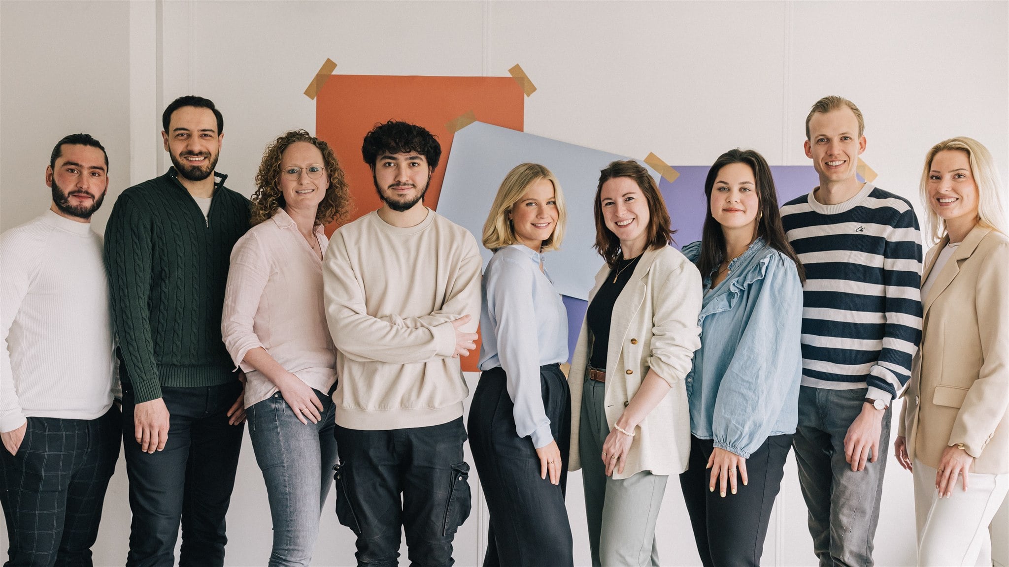 Textmetrics team diverse group of colleagues smiling