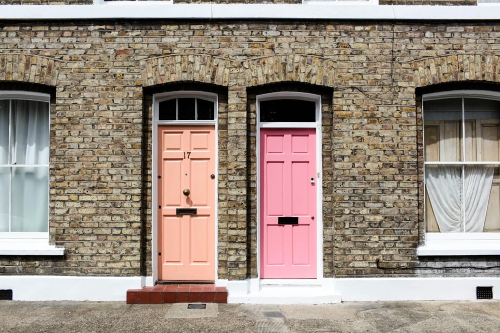 Two doors, one orange, one pink
